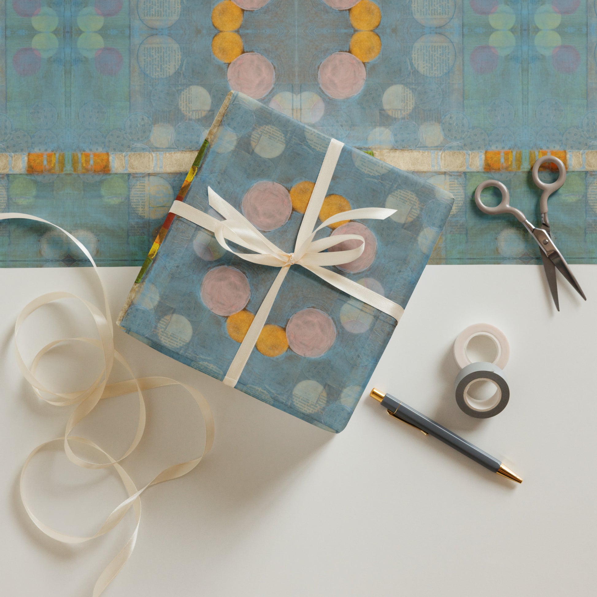geometric wrapping paper displayed flat and as a wrapped present